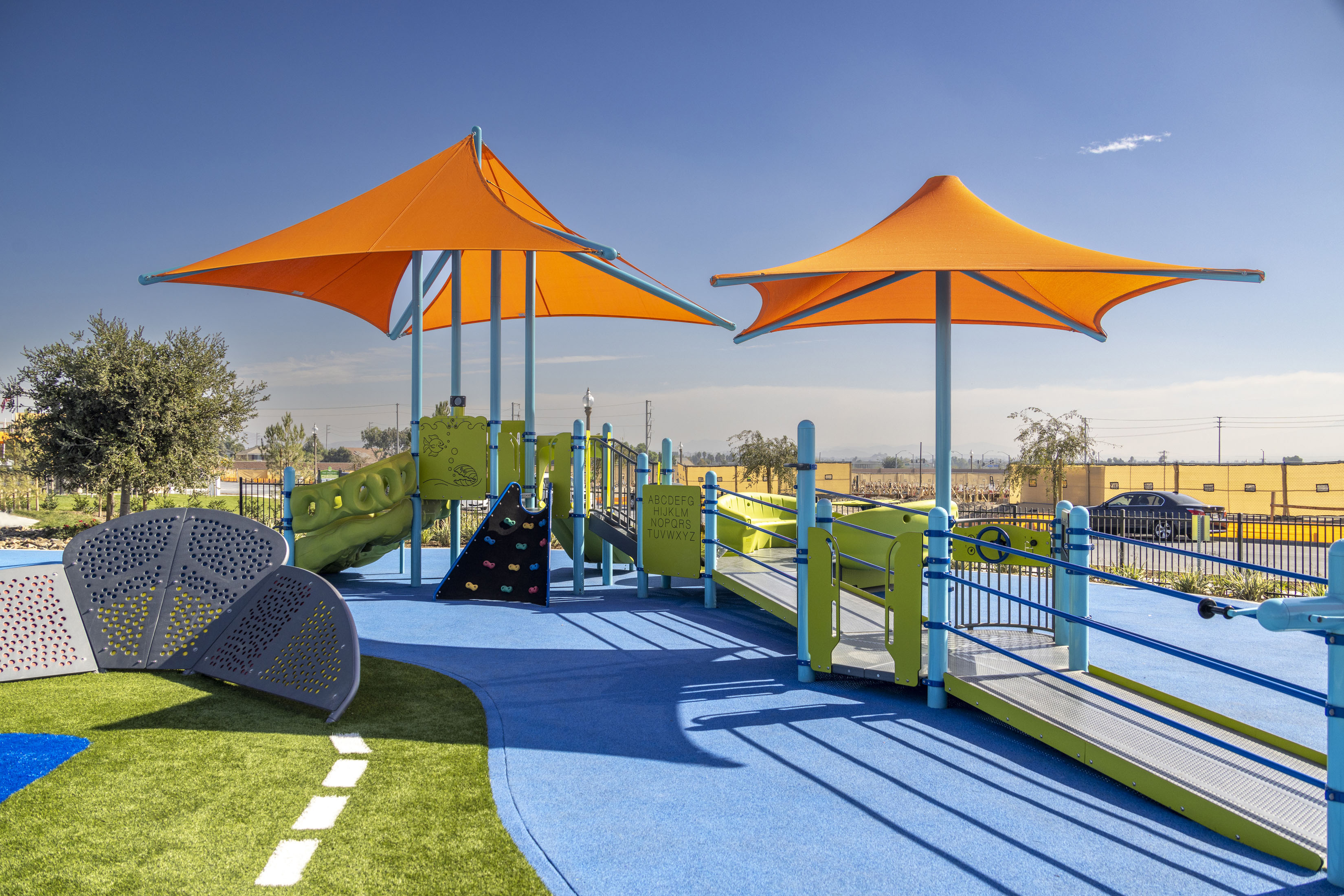 A swimming pool with umbrellas.