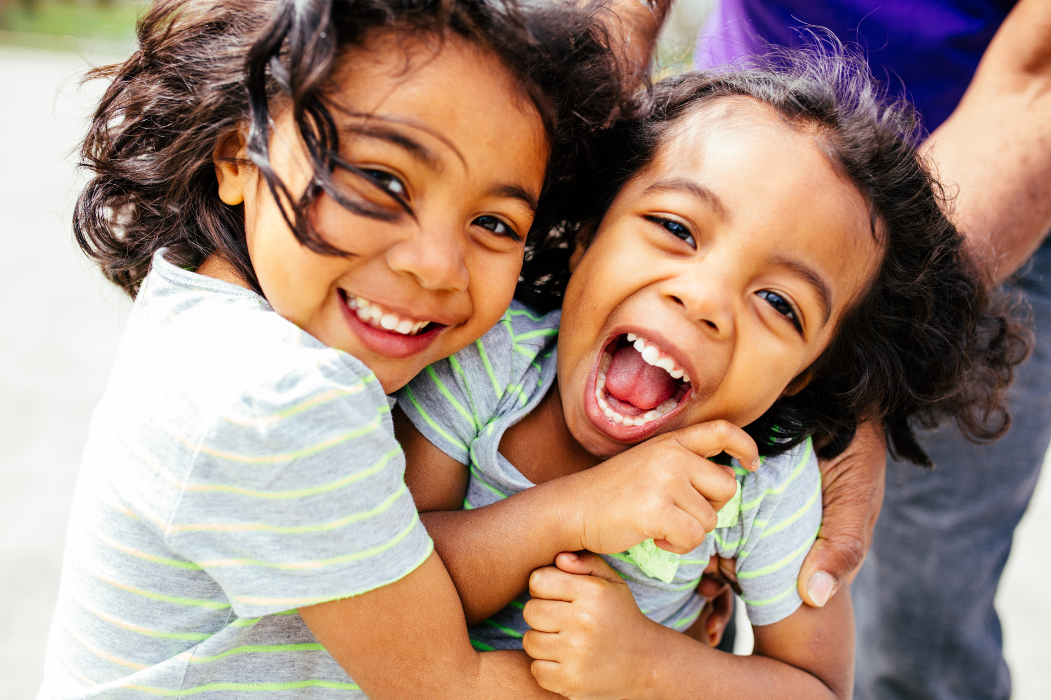 A person holding a baby.