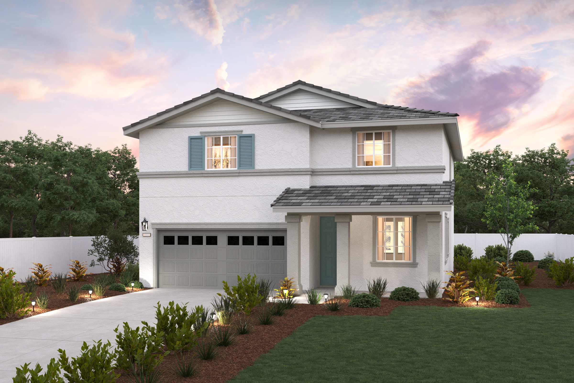 A white house with a driveway.