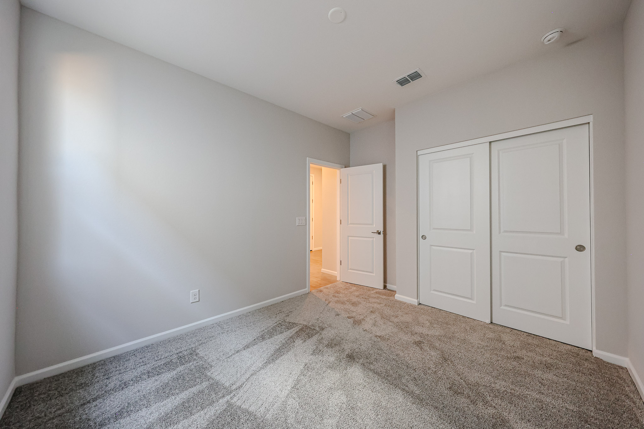 A room with white doors.
