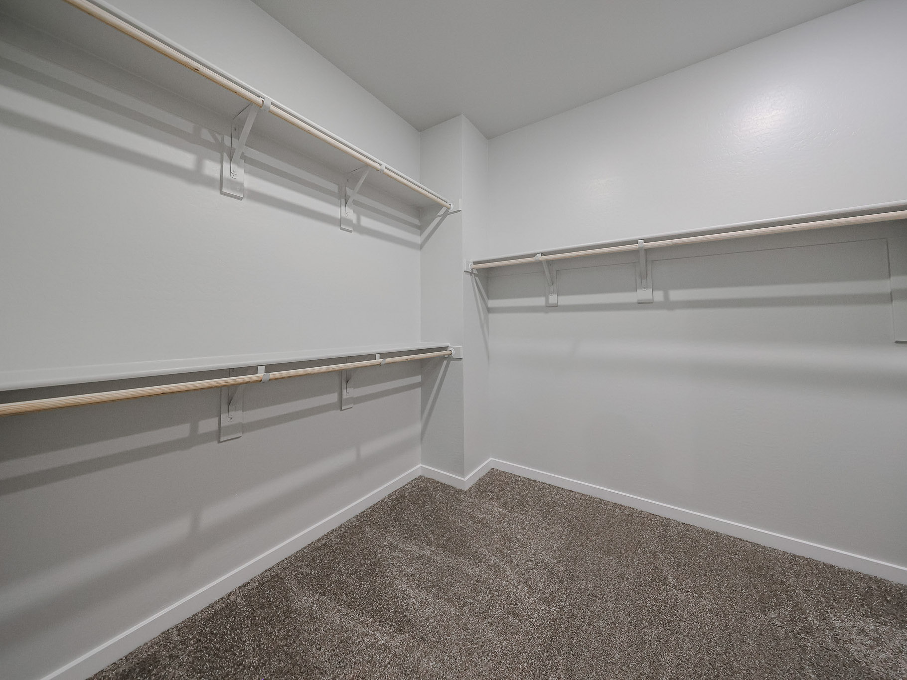 A white room with a staircase.