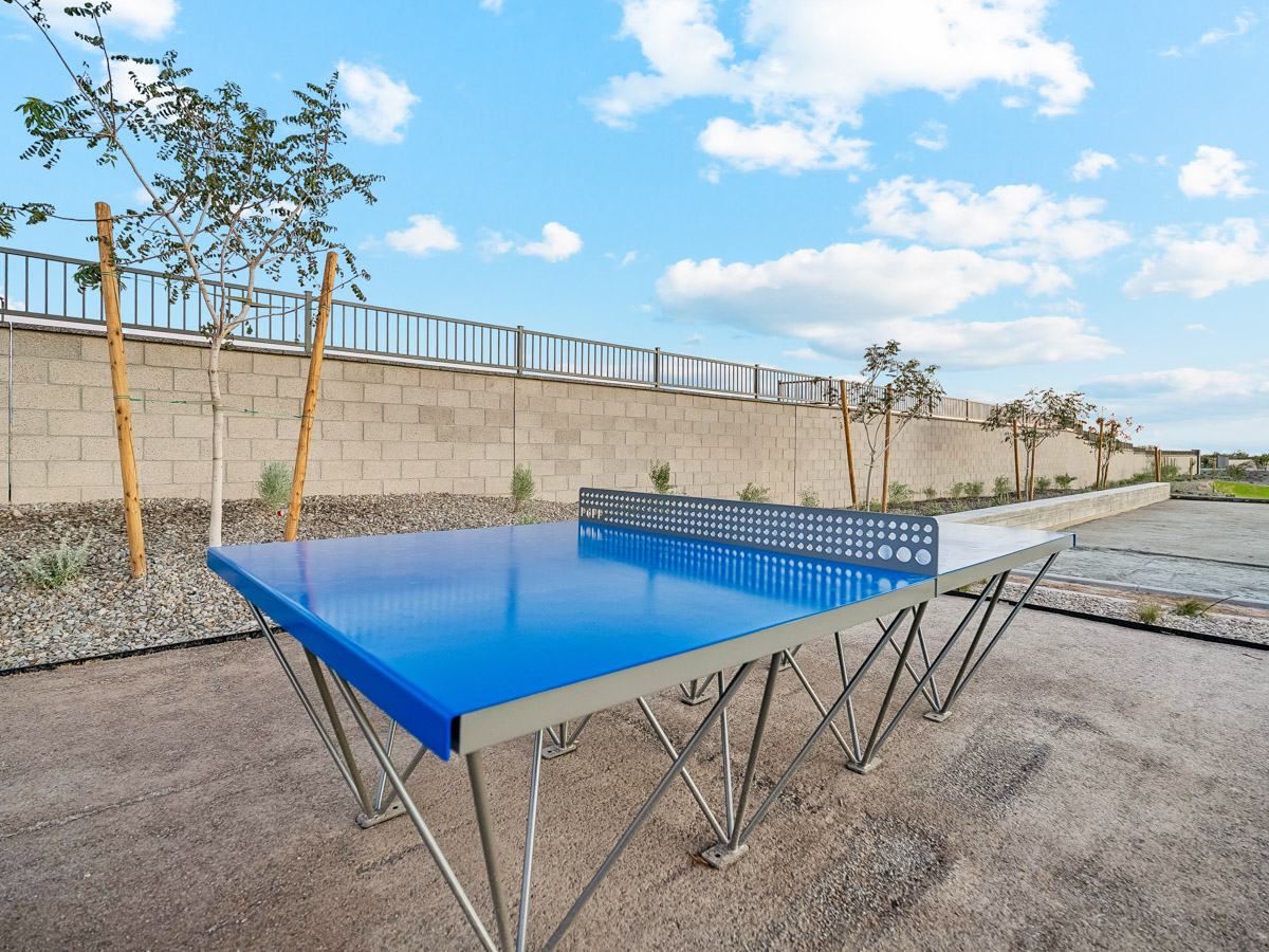 A table and chairs outside.
