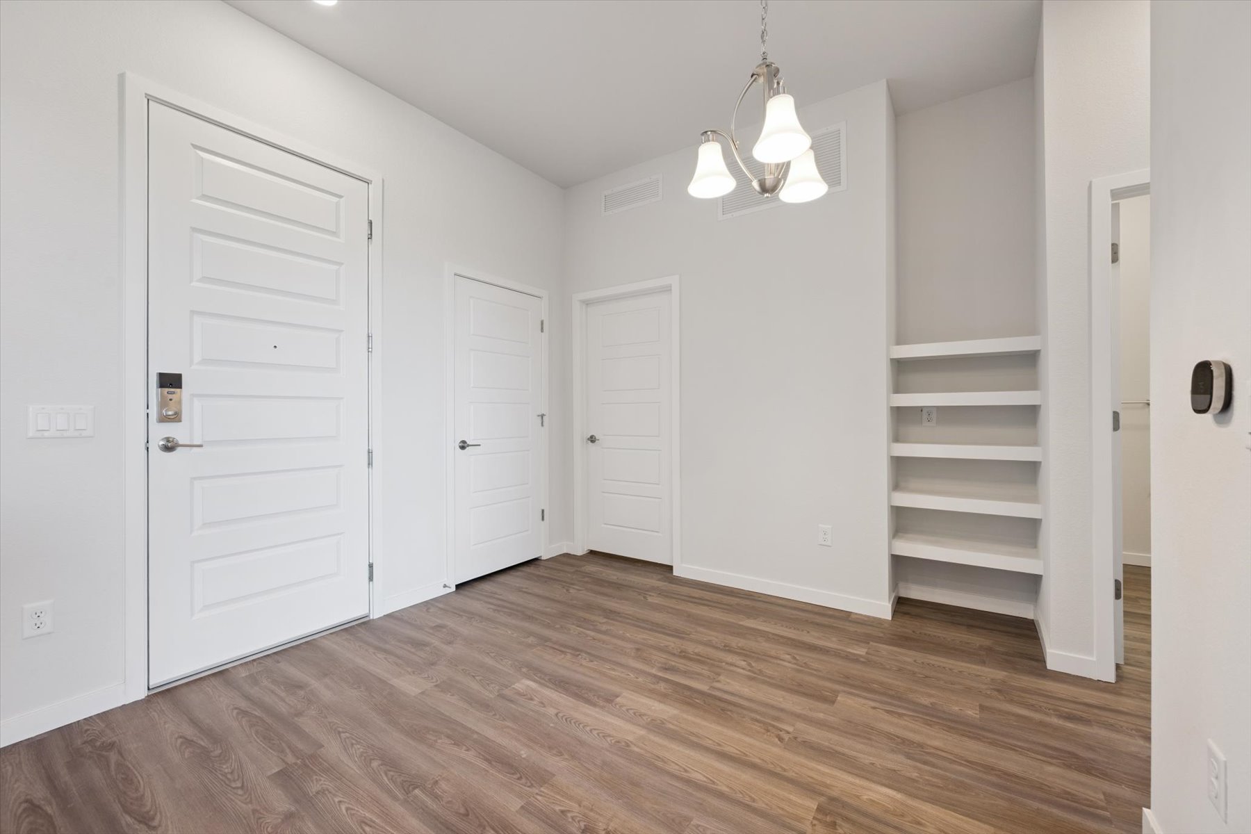 A room with white doors.