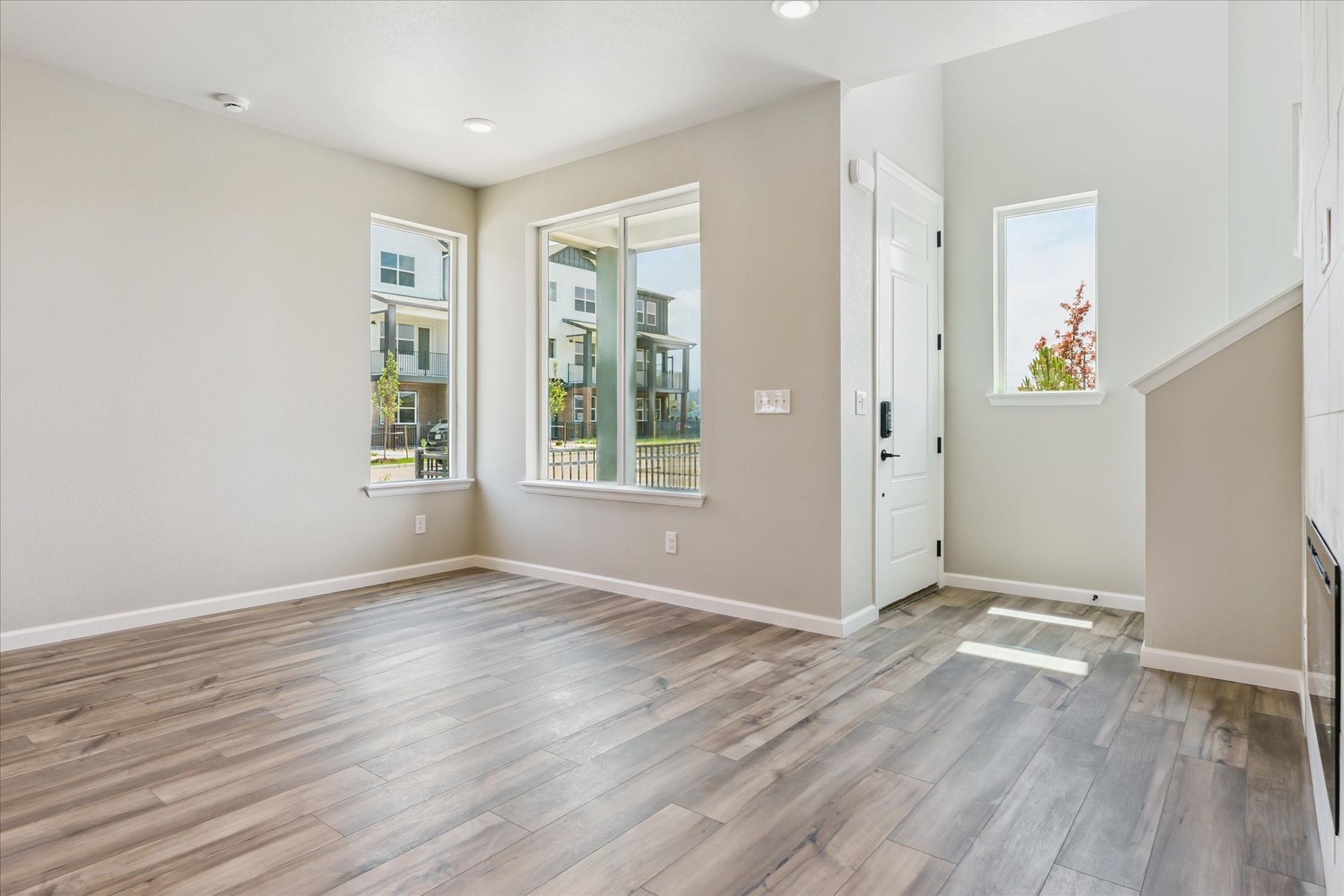 A room with a wood floor and a wood floor.