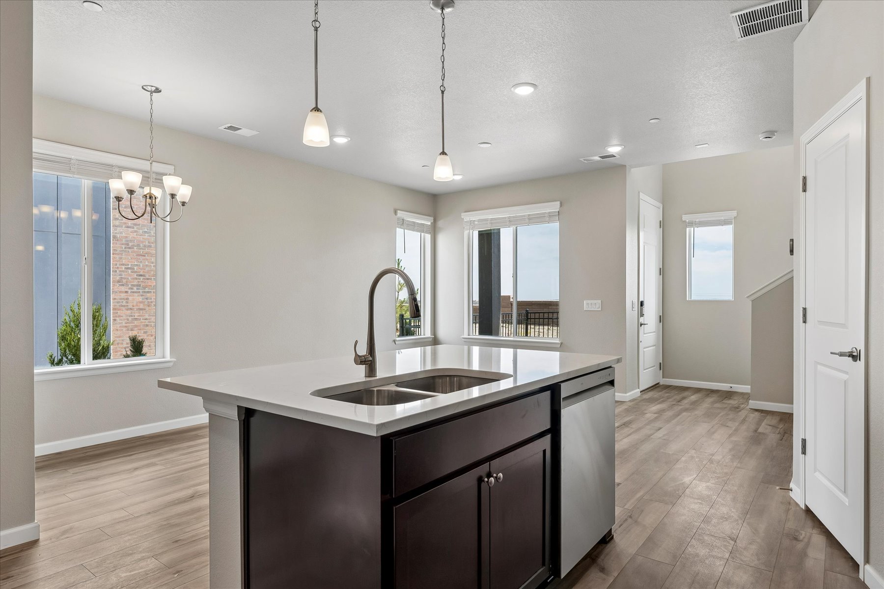 A kitchen with a marble countertop.