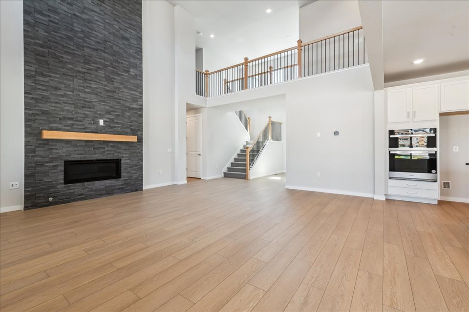 A large kitchen with white walls.
