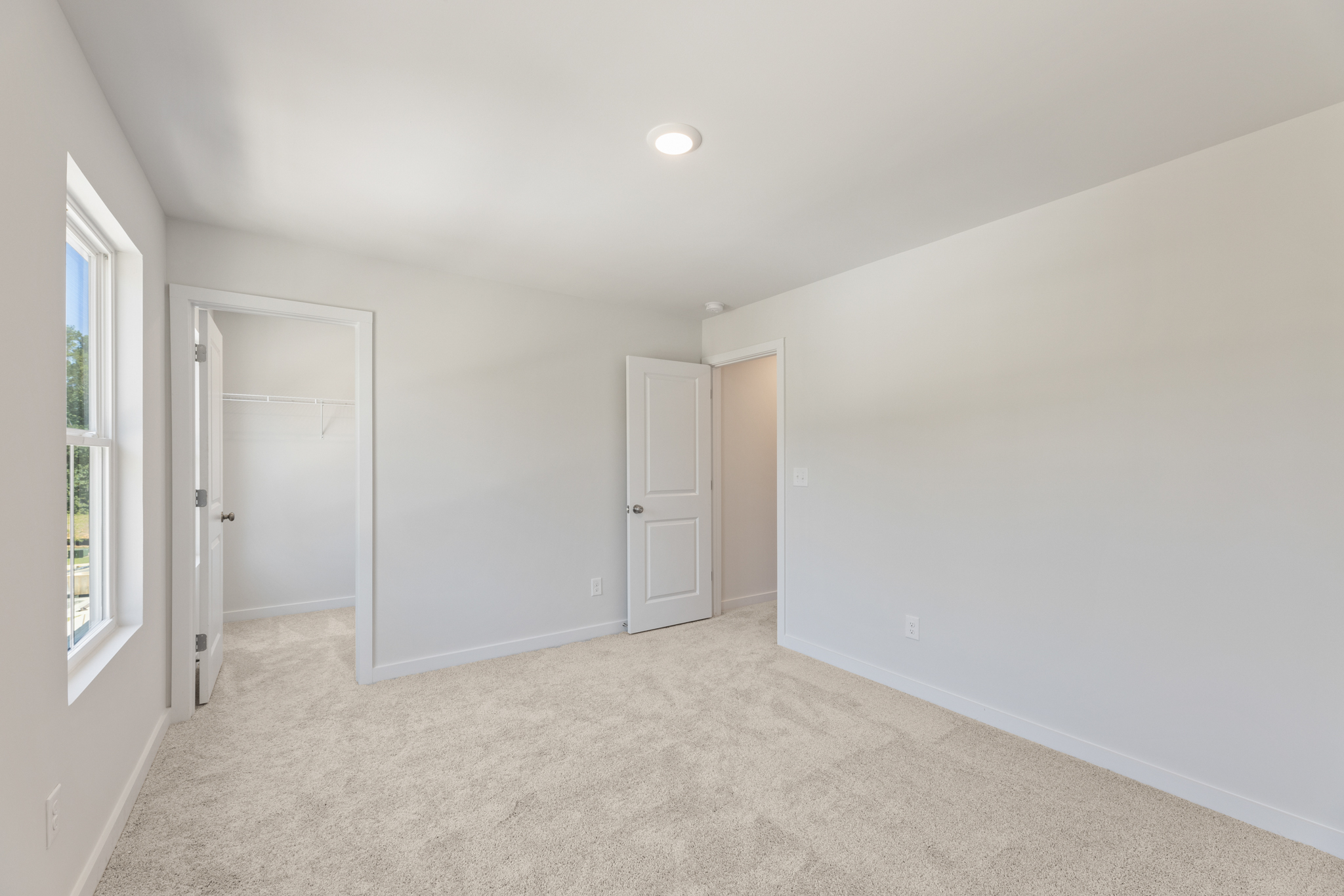 A room with white doors.