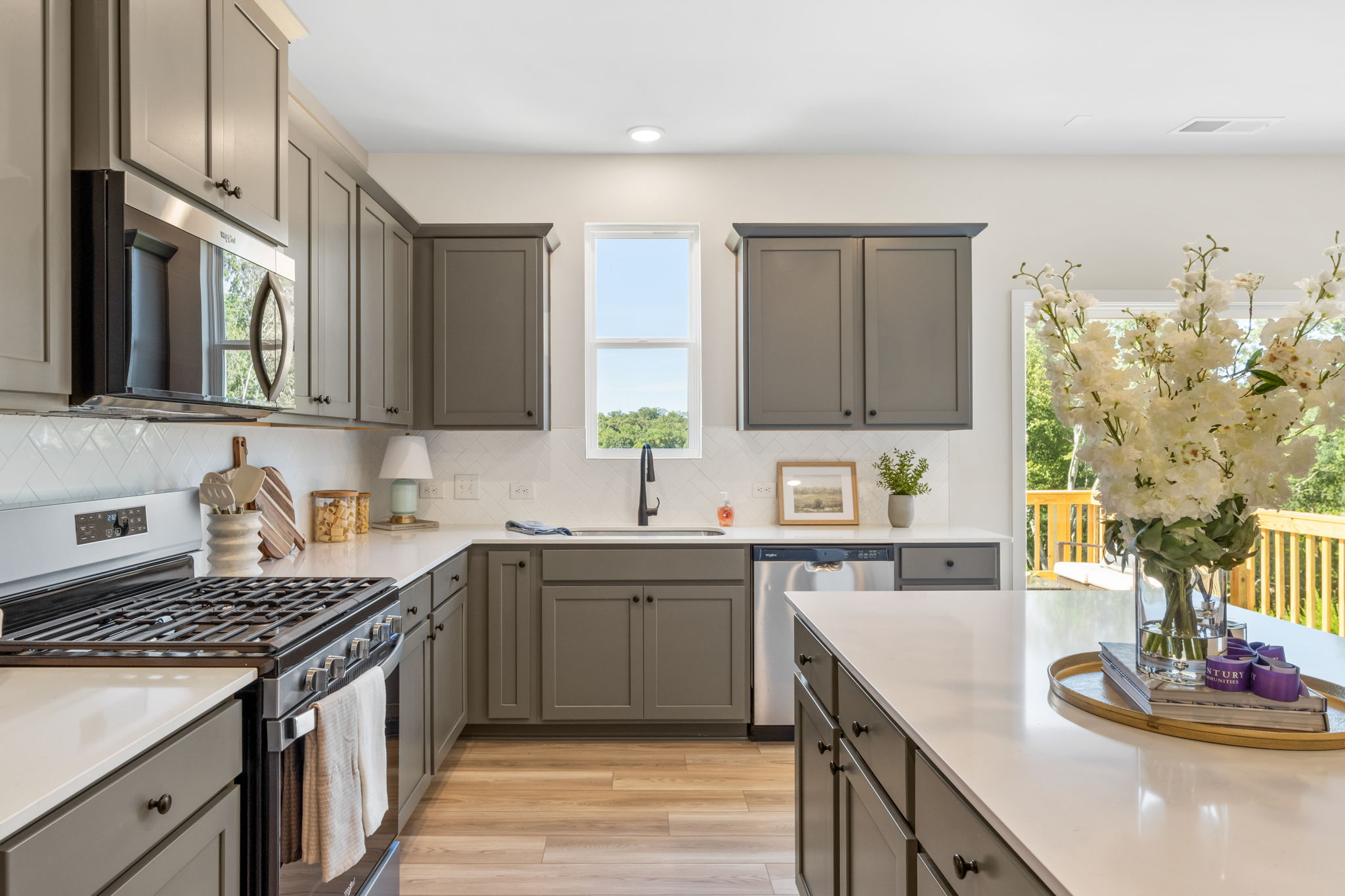 A kitchen with black appliances.