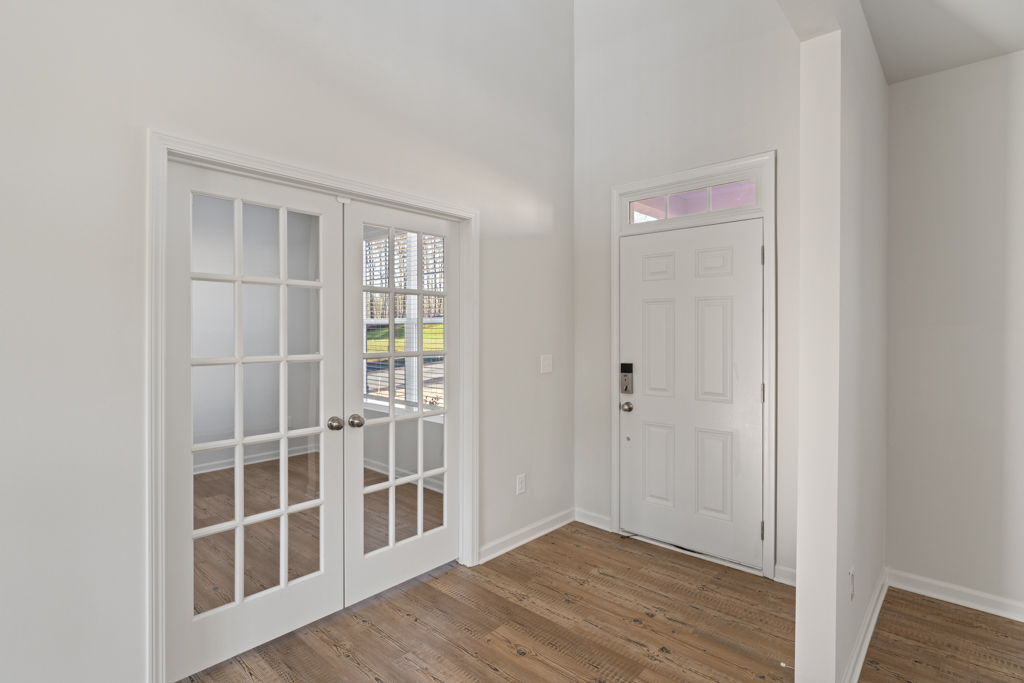 A room with white doors.