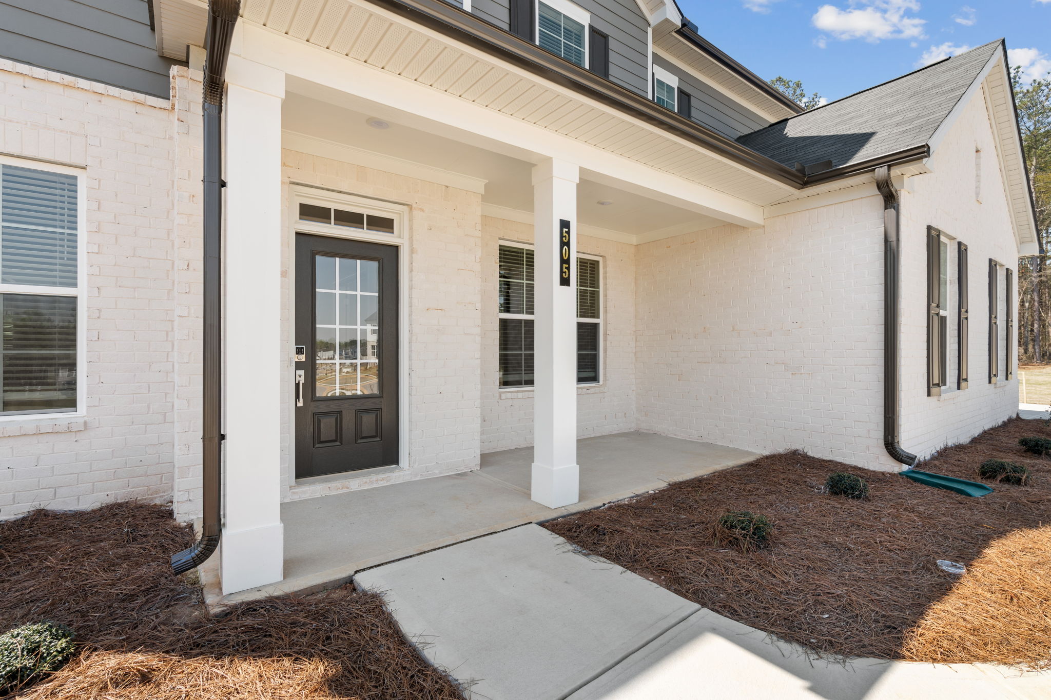 A house with a front yard.