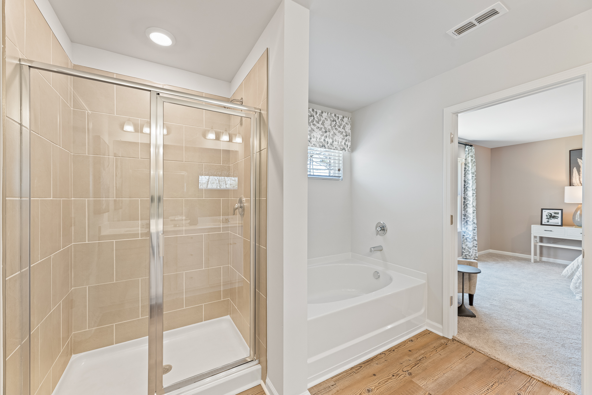 A bathroom with a glass shower.