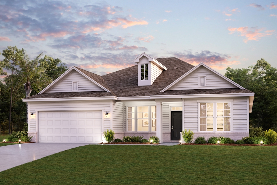 A house with a lawn in front.