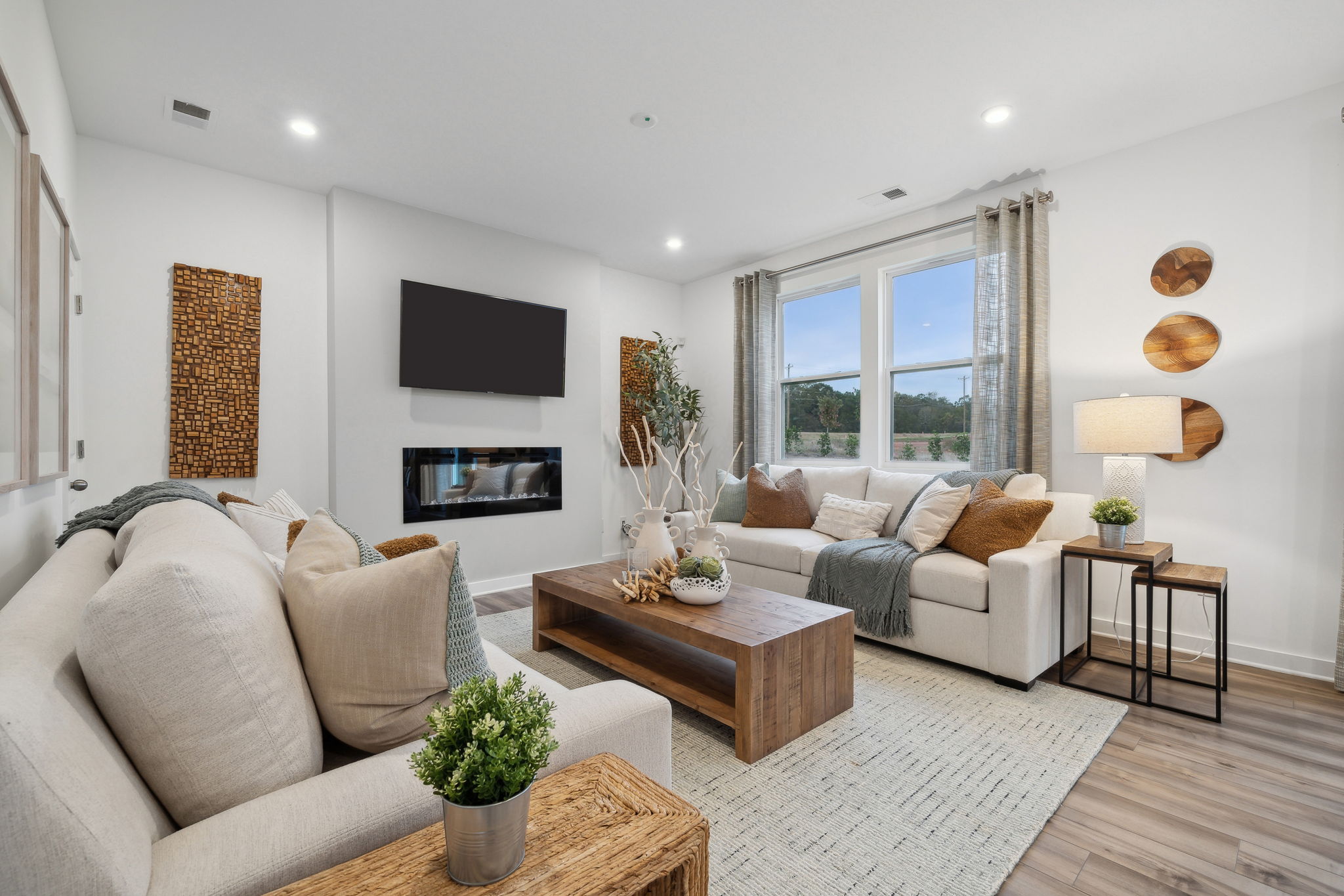 A living room with a fireplace.