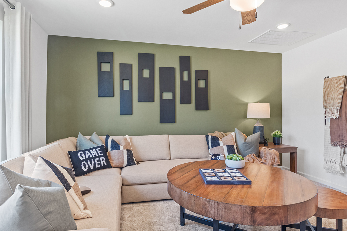 A living room with a couch and a coffee table.