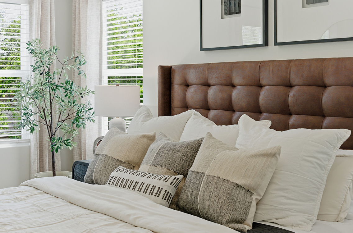 A couch with pillows.