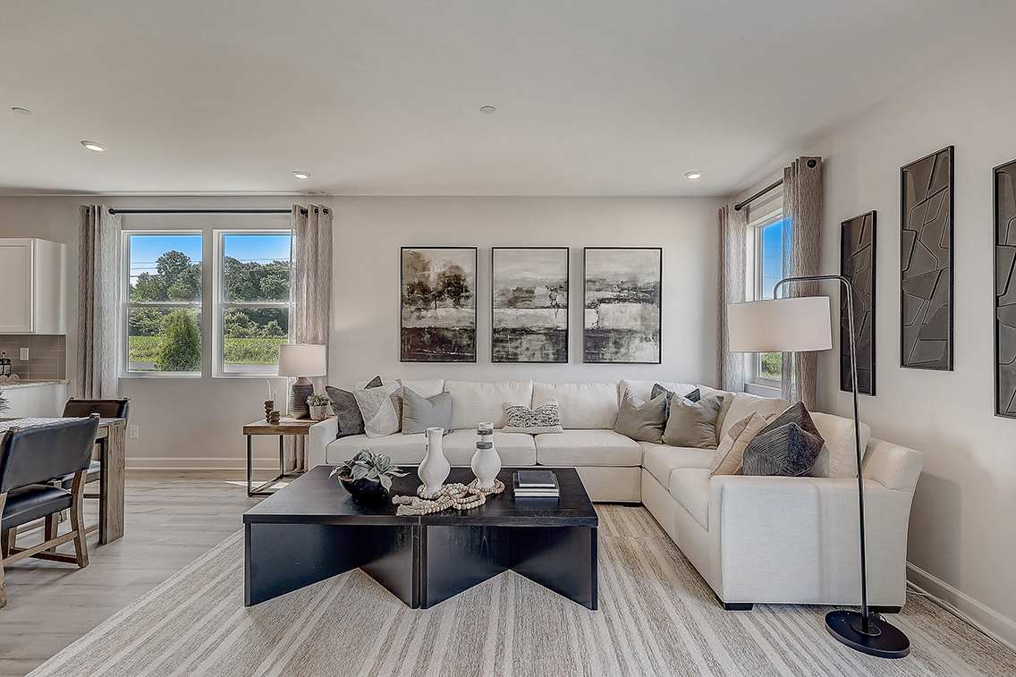 A living room with a large window.