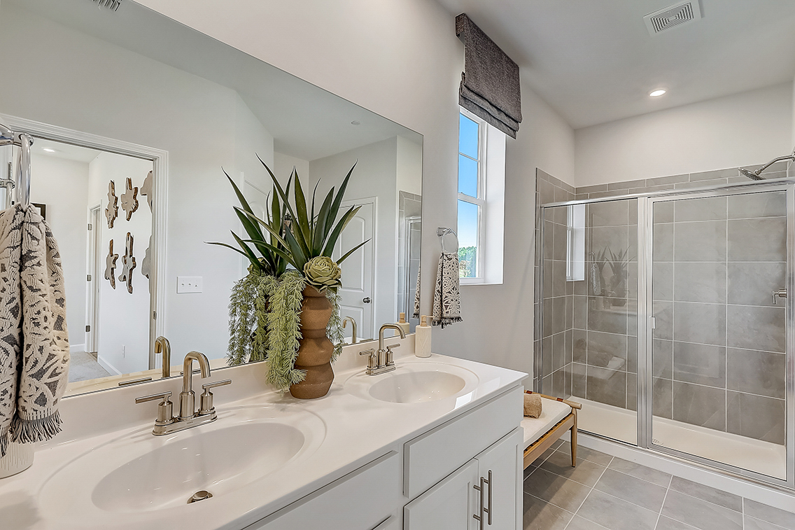 A bathroom with a glass shower.