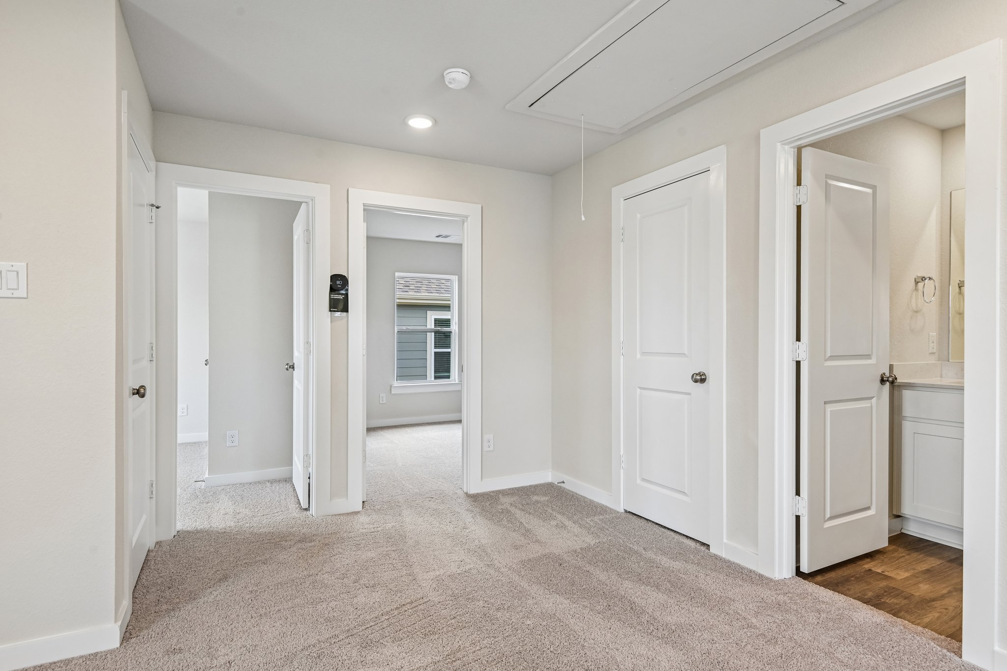 A room with white doors.