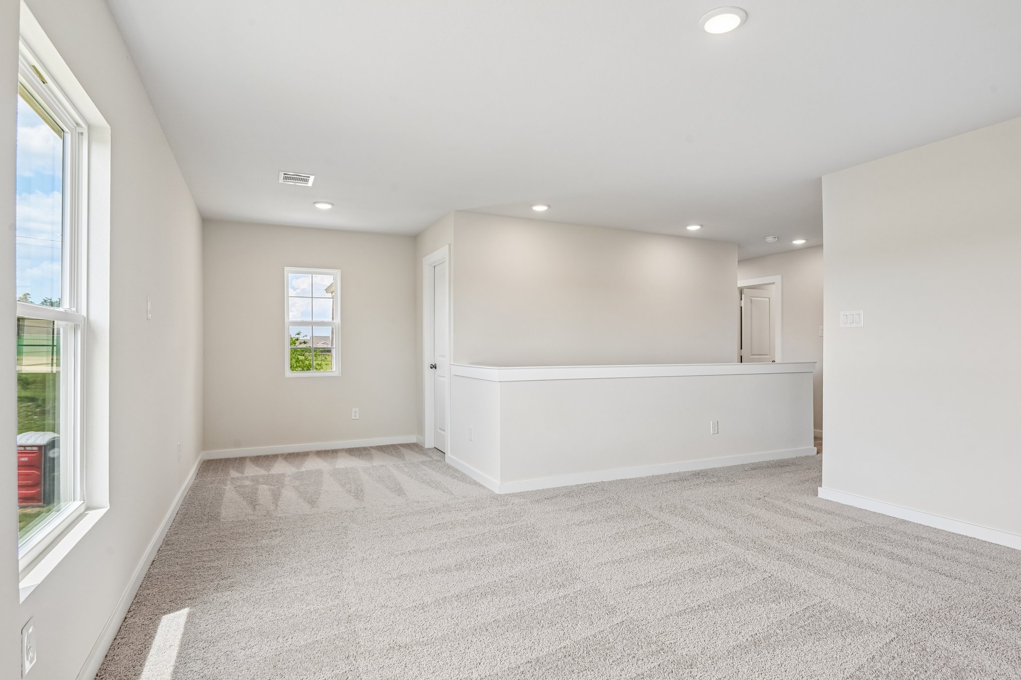 A room with white walls and a white floor.