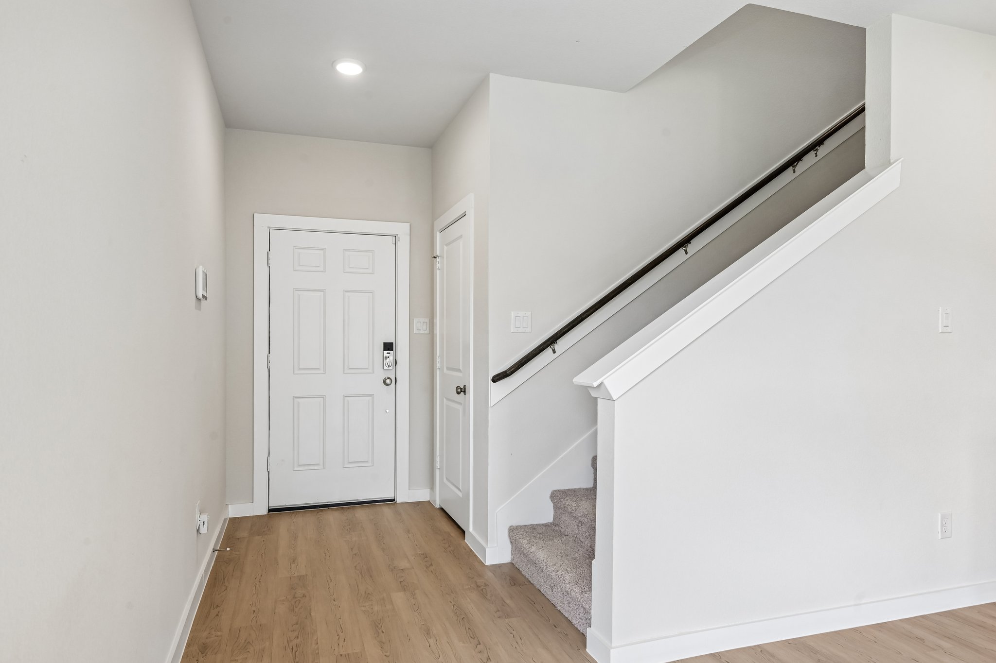 A white staircase in a house.