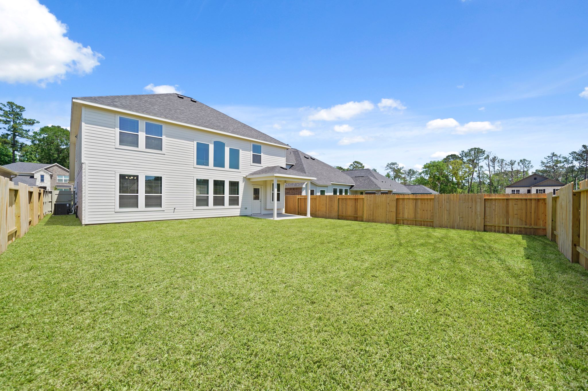 A house with a fence around it.