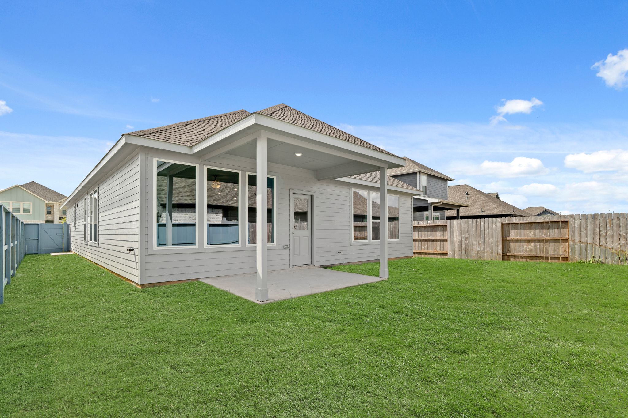 A house with a fence around it.