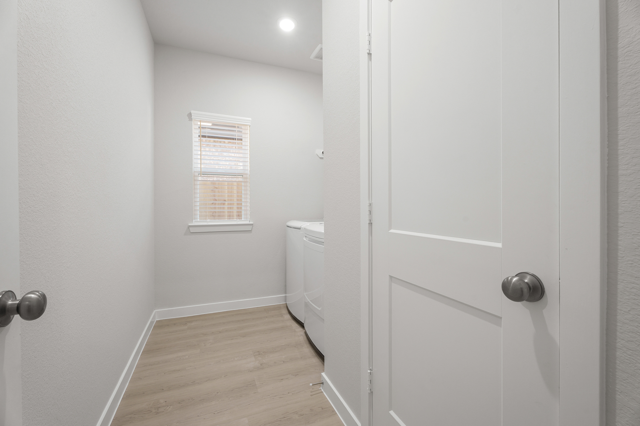 A white door in a room.