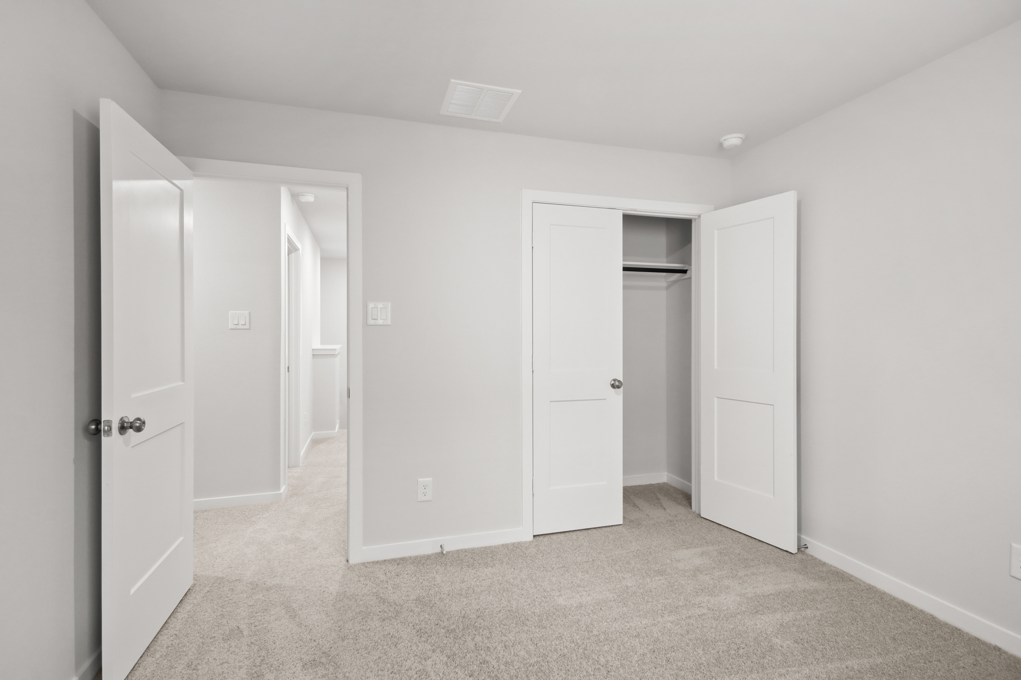 A room with white doors.