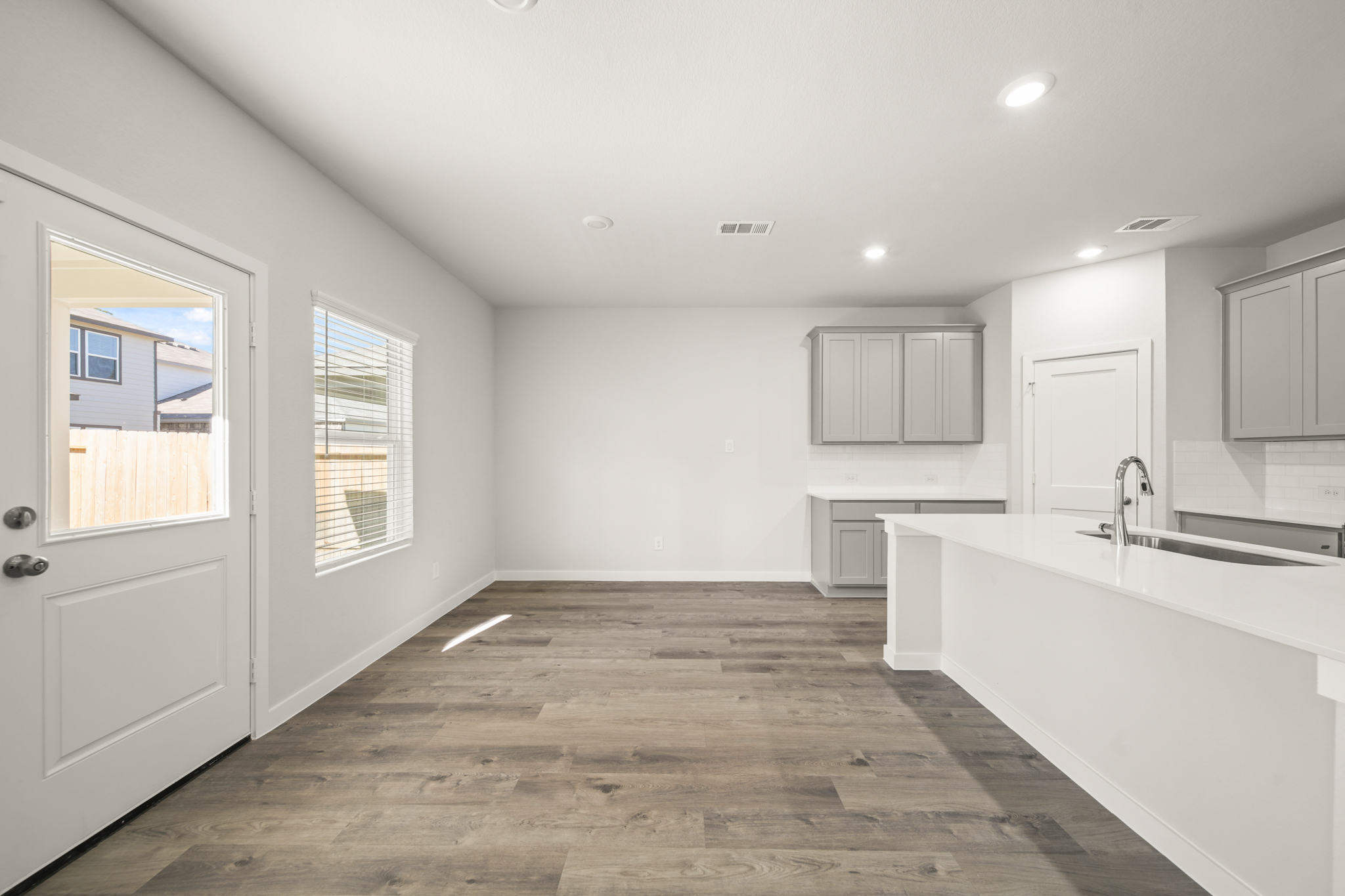A bathroom with a wood floor.