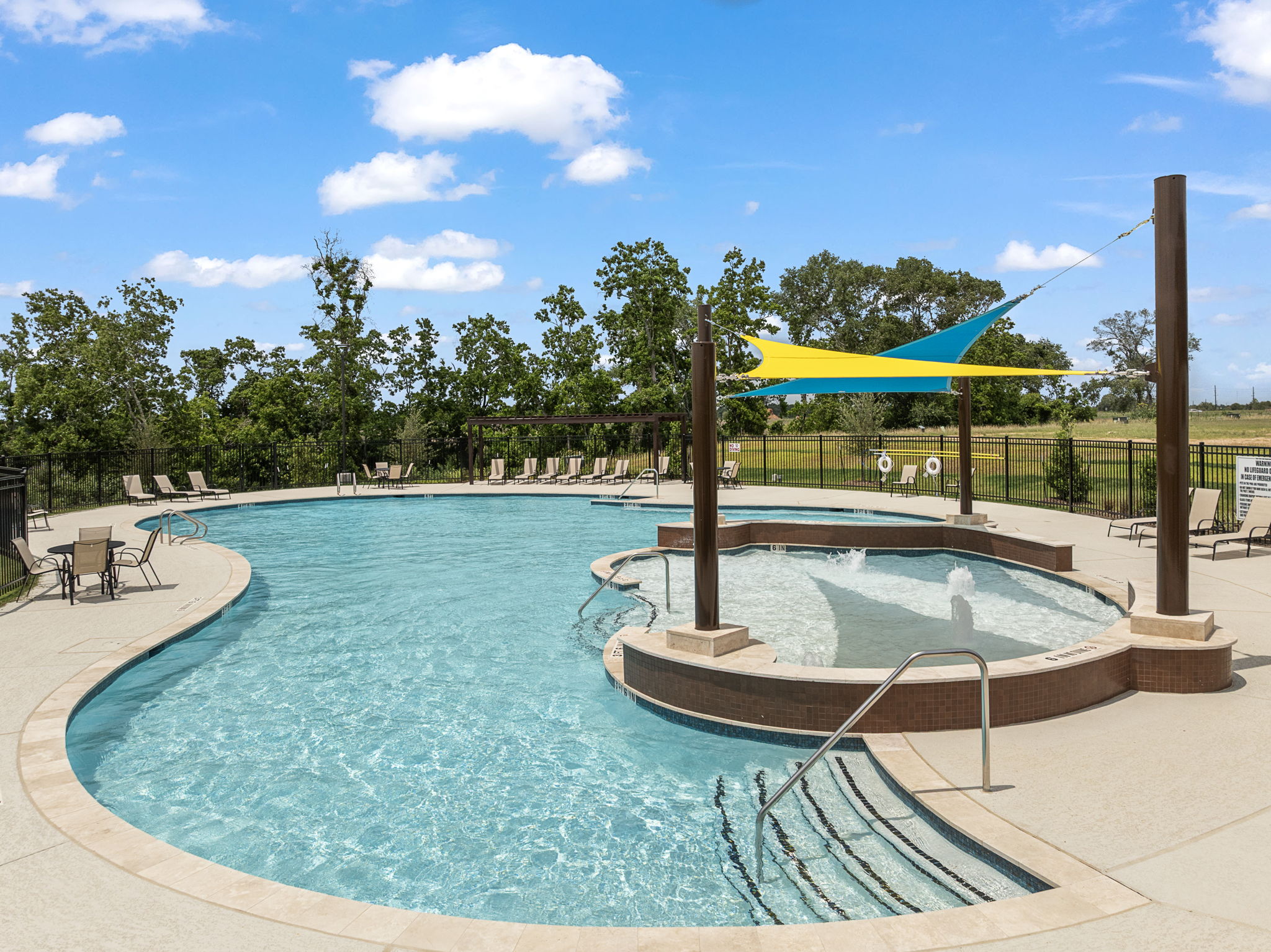 A swimming pool with a slide.