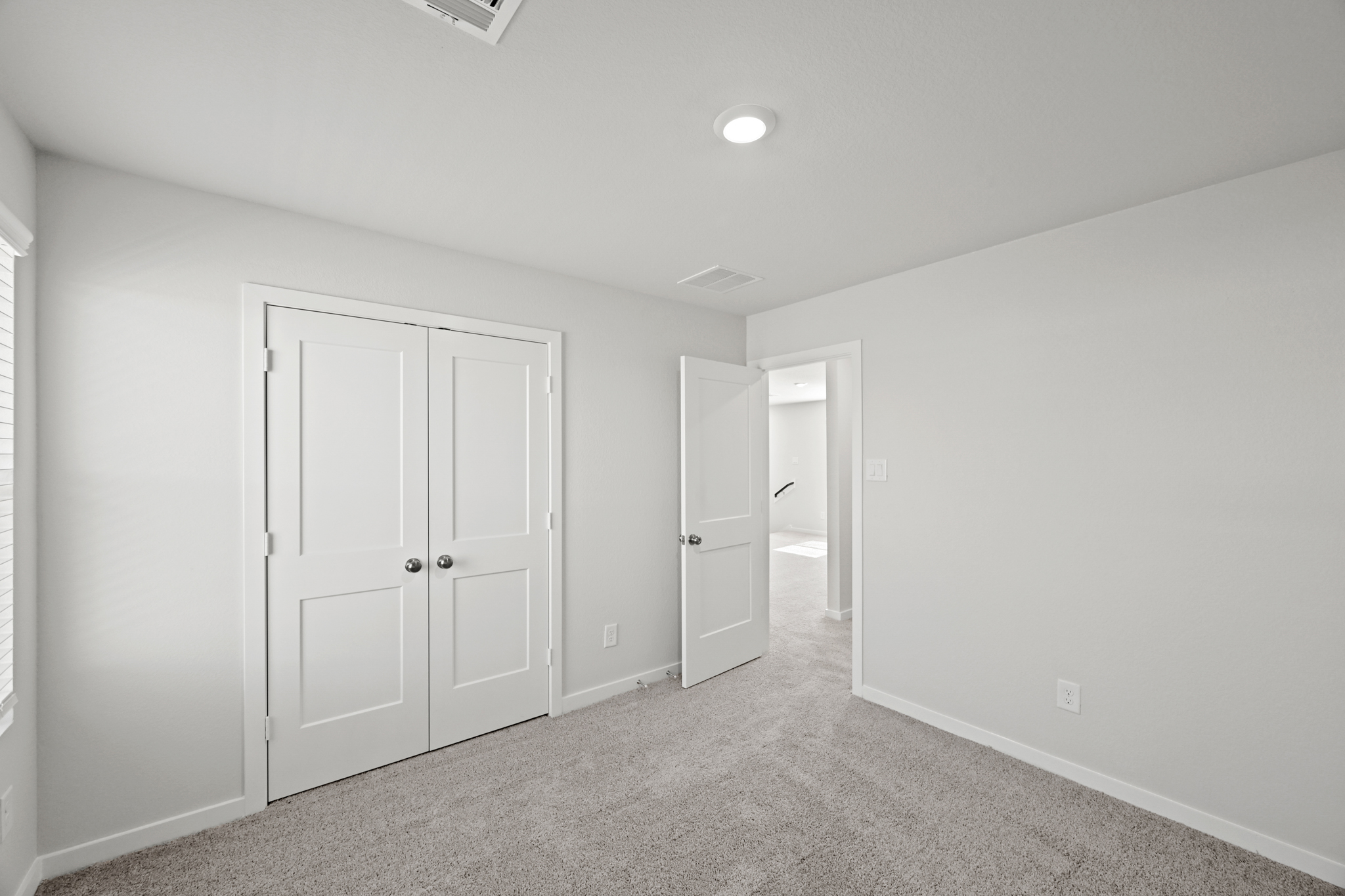 A room with white doors.