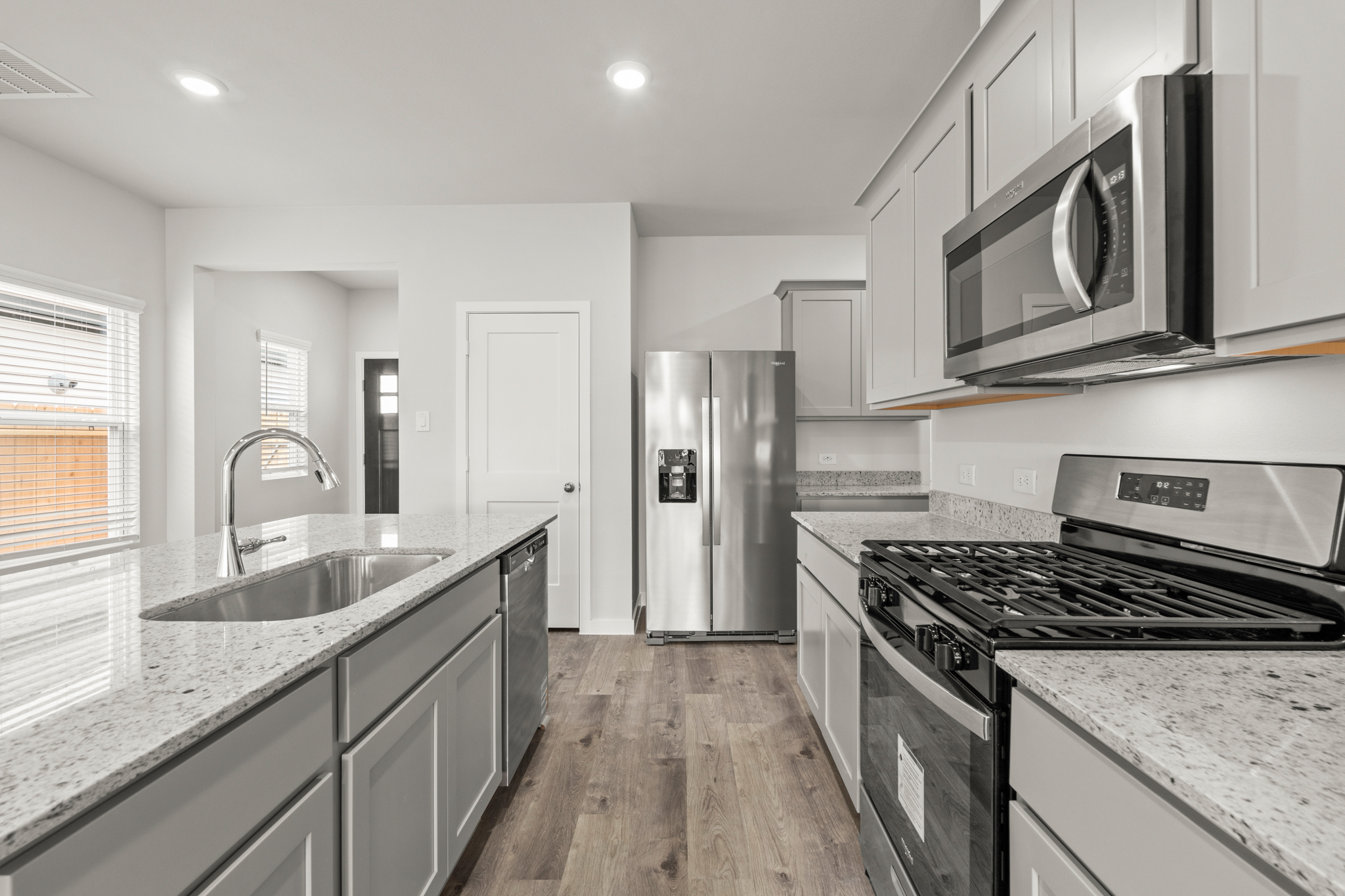 A kitchen with stainless steel appliances.