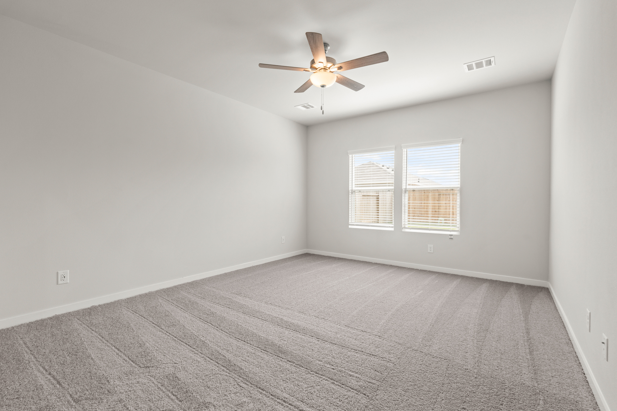 A ceiling fan in a room.
