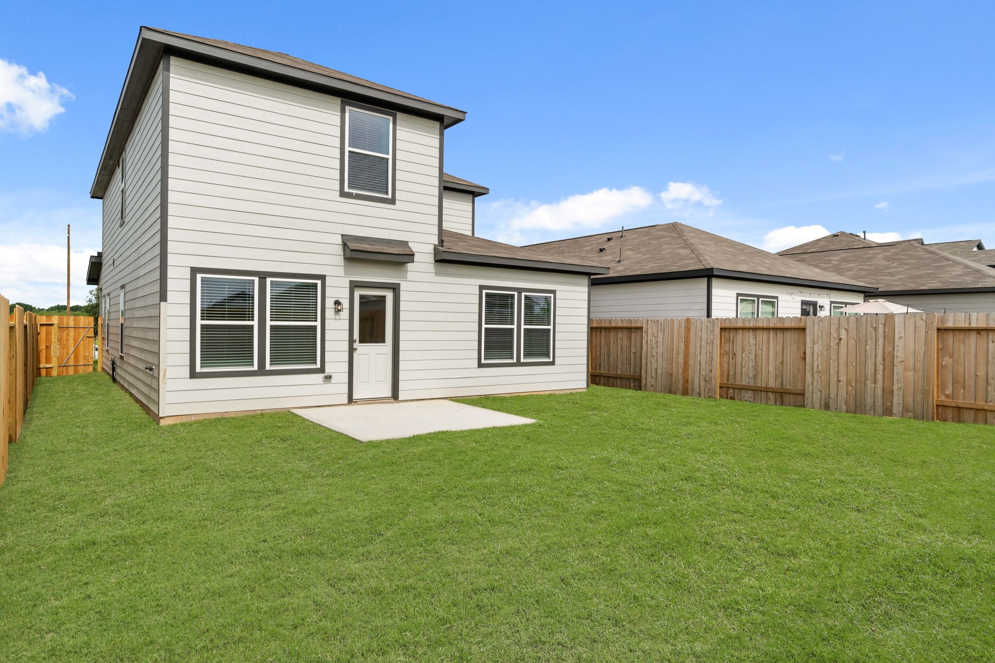A house with a fence around it.