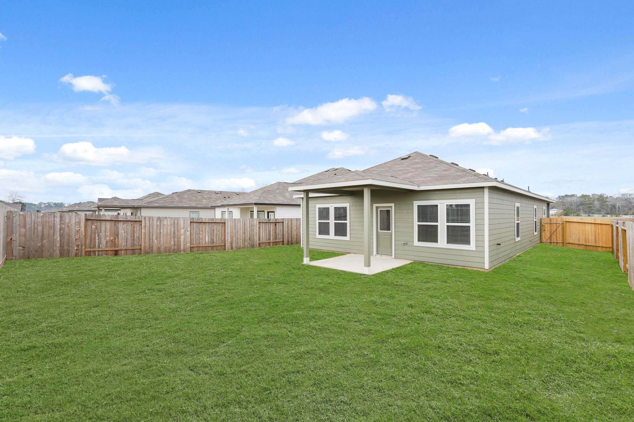 A house with a fence around it.