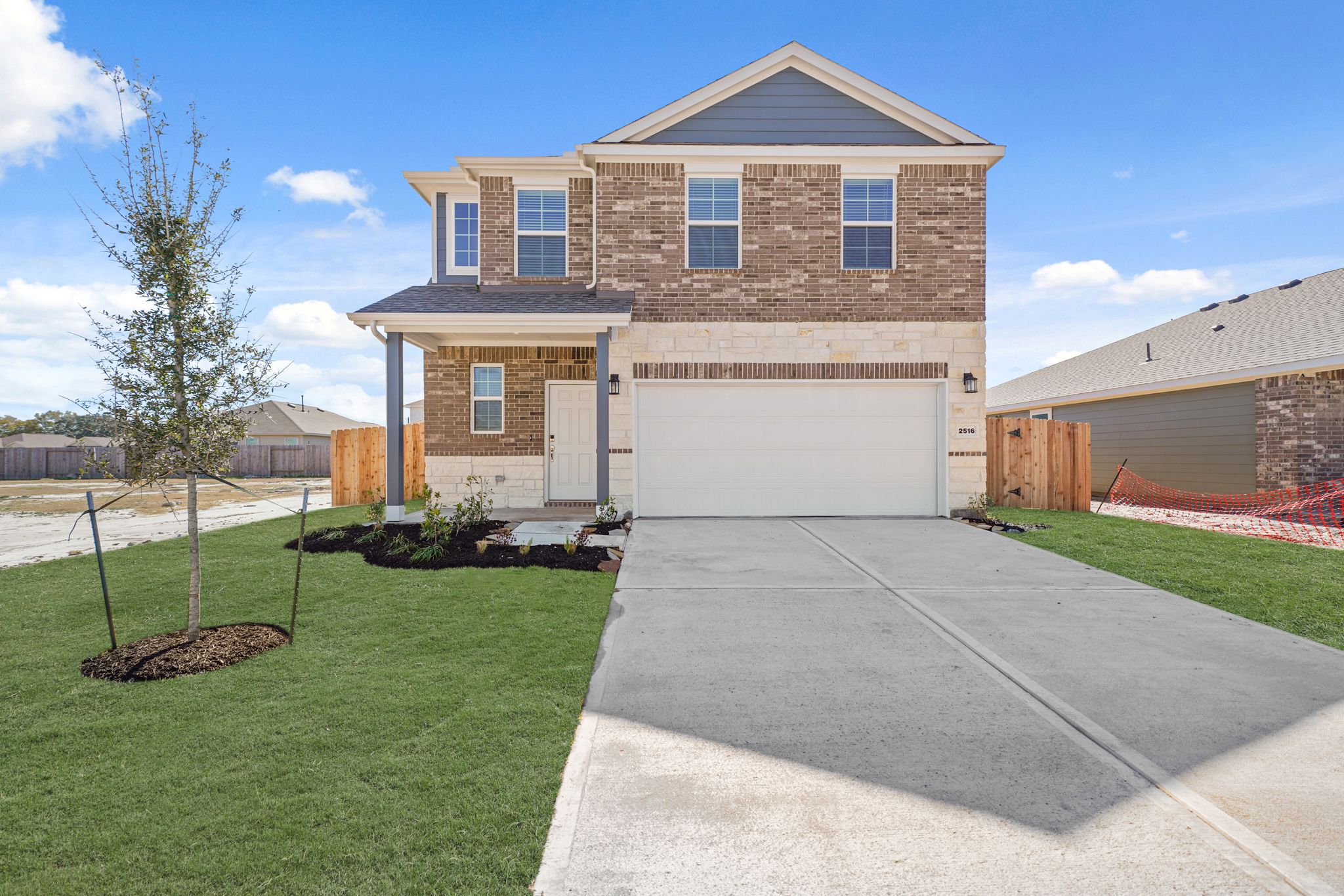 A house with a driveway.