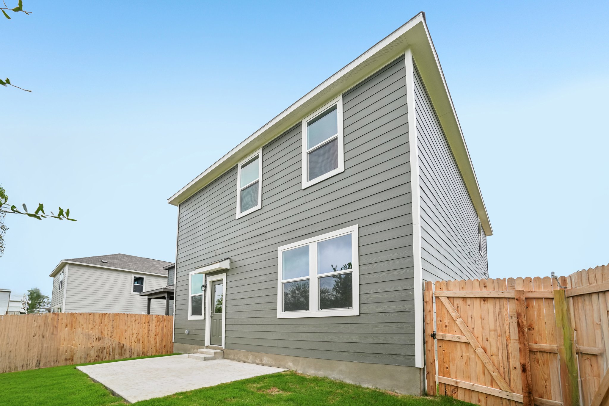A house with a fence around it.