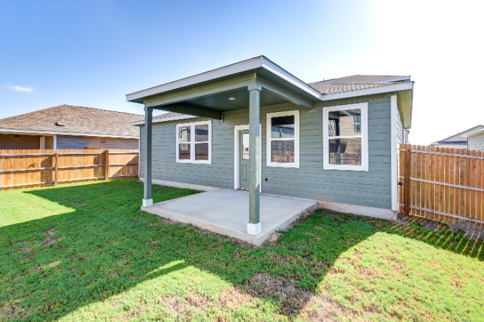 A house with a fence around it.