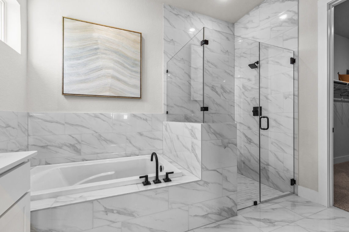 A bathroom with a glass shower.