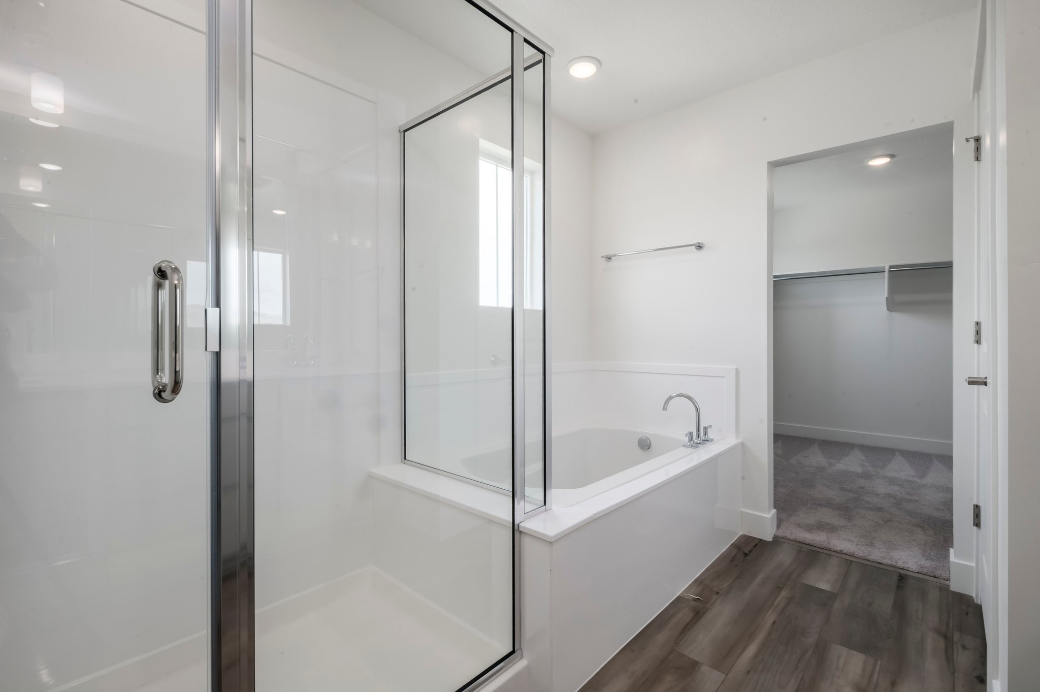 A bathroom with a glass shower.