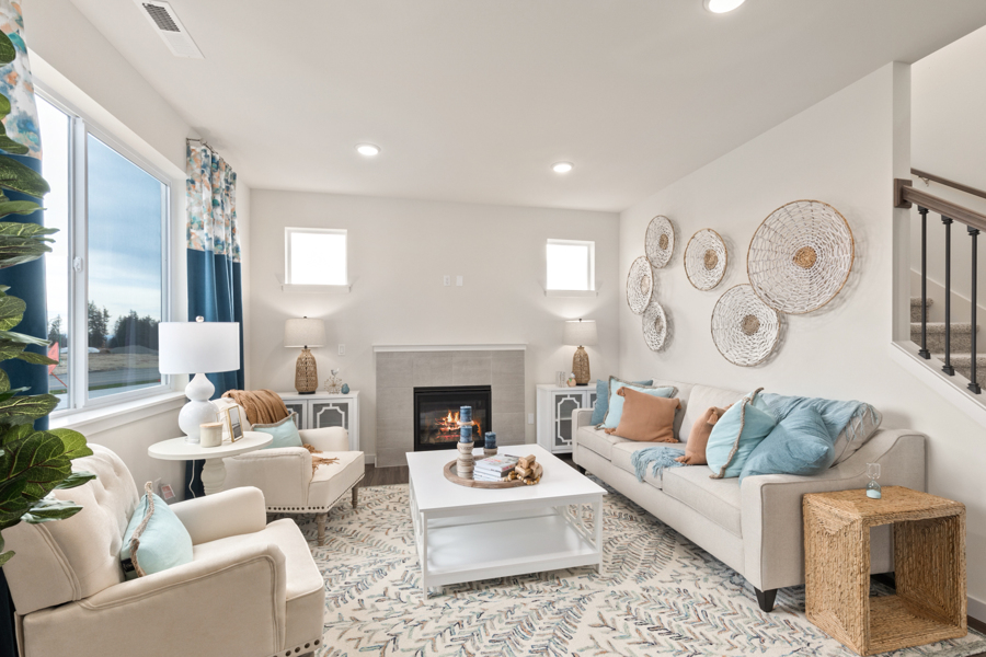 A living room with a fireplace.