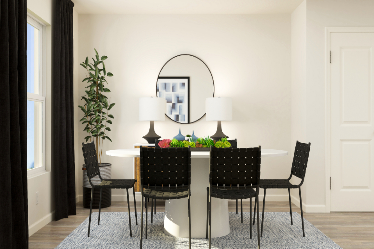 A dining room table with a mirror.