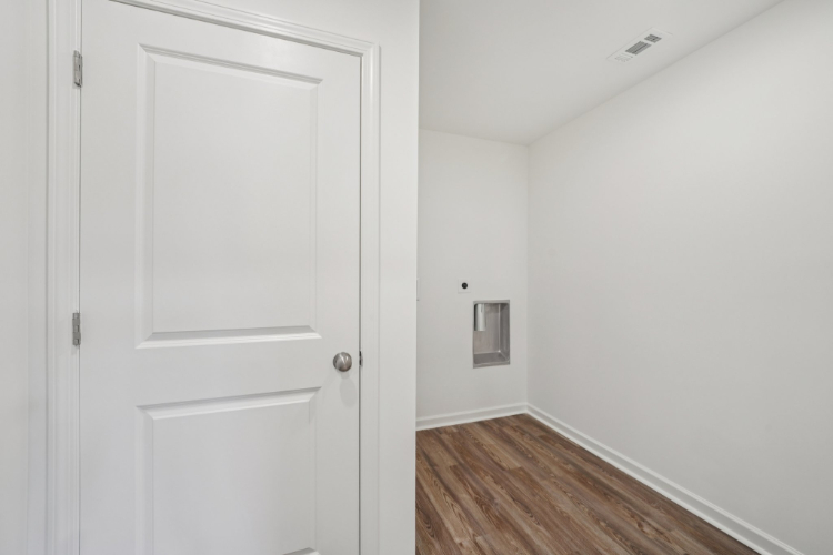 A white door in a room.