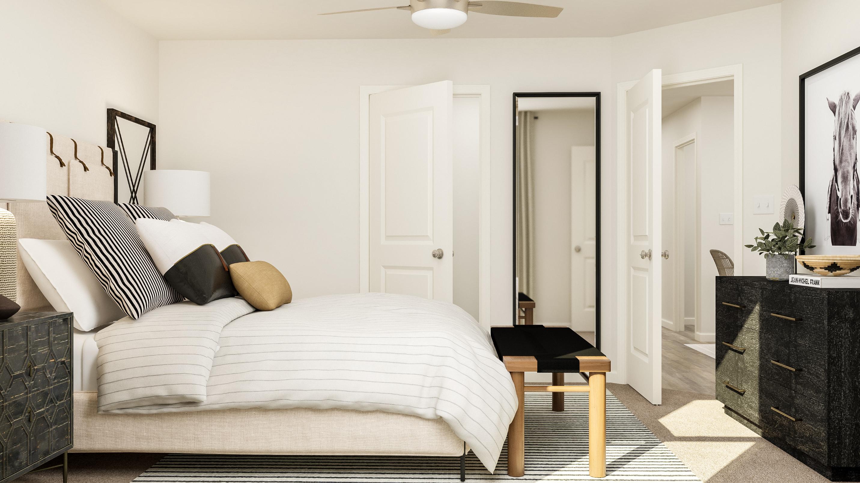 A bedroom with a bed and a piano.