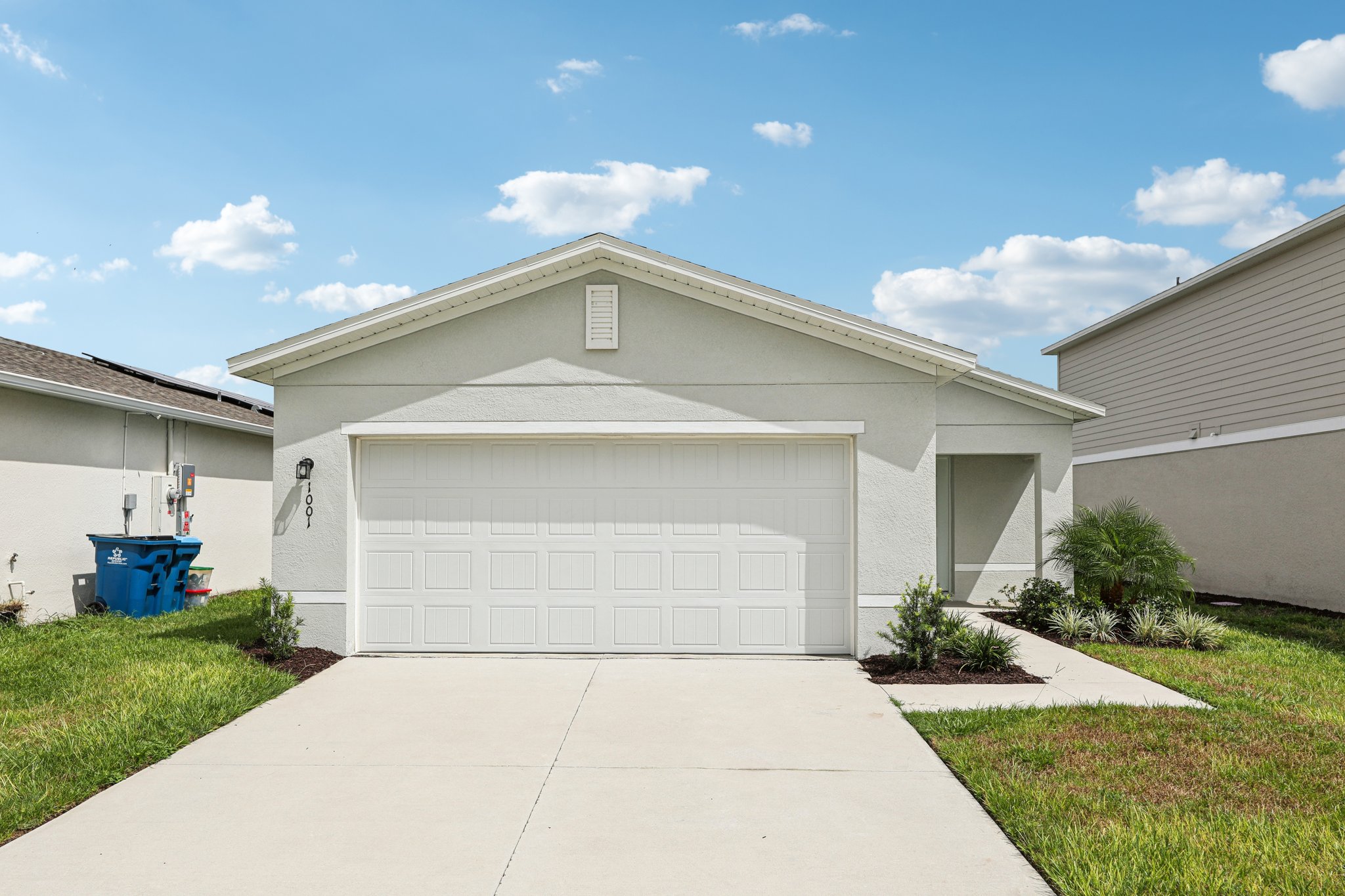 A garage in a neighborhood.