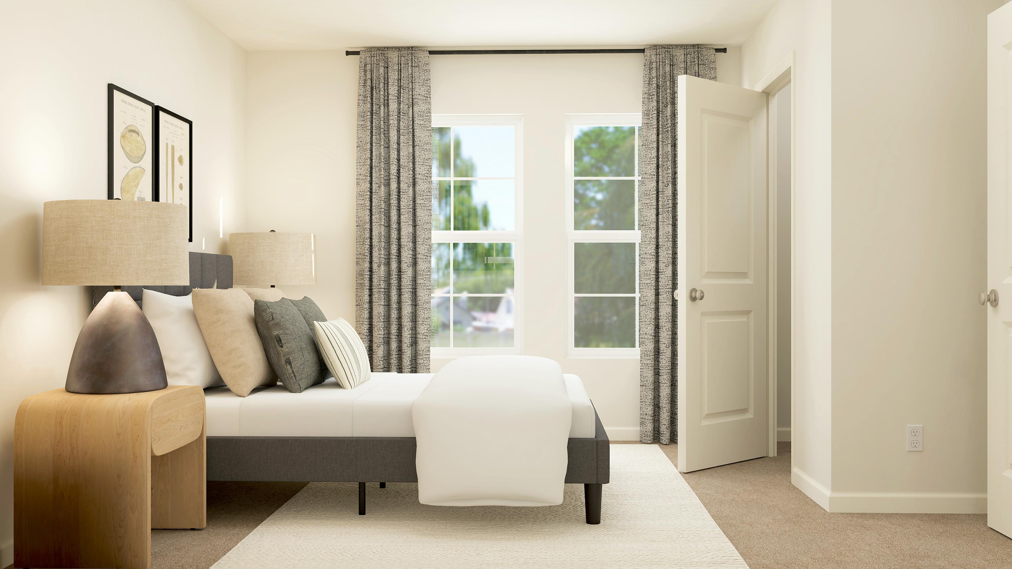 A living room with a couch and a chair.