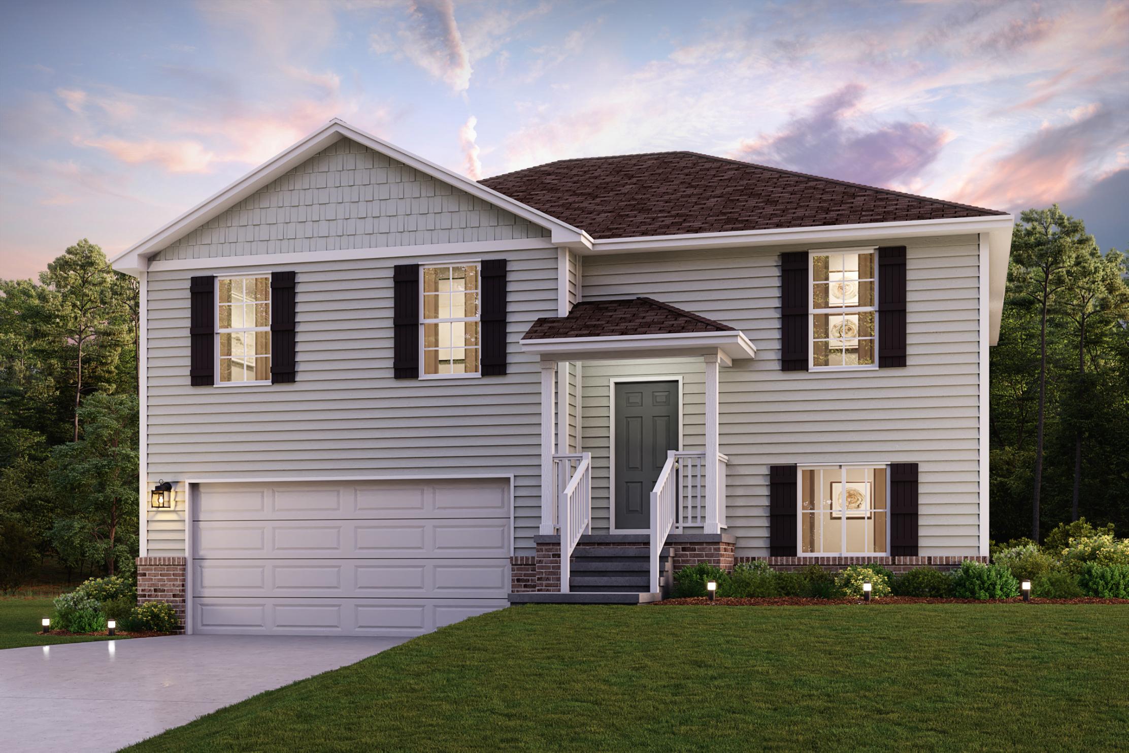 A white house with a green lawn.