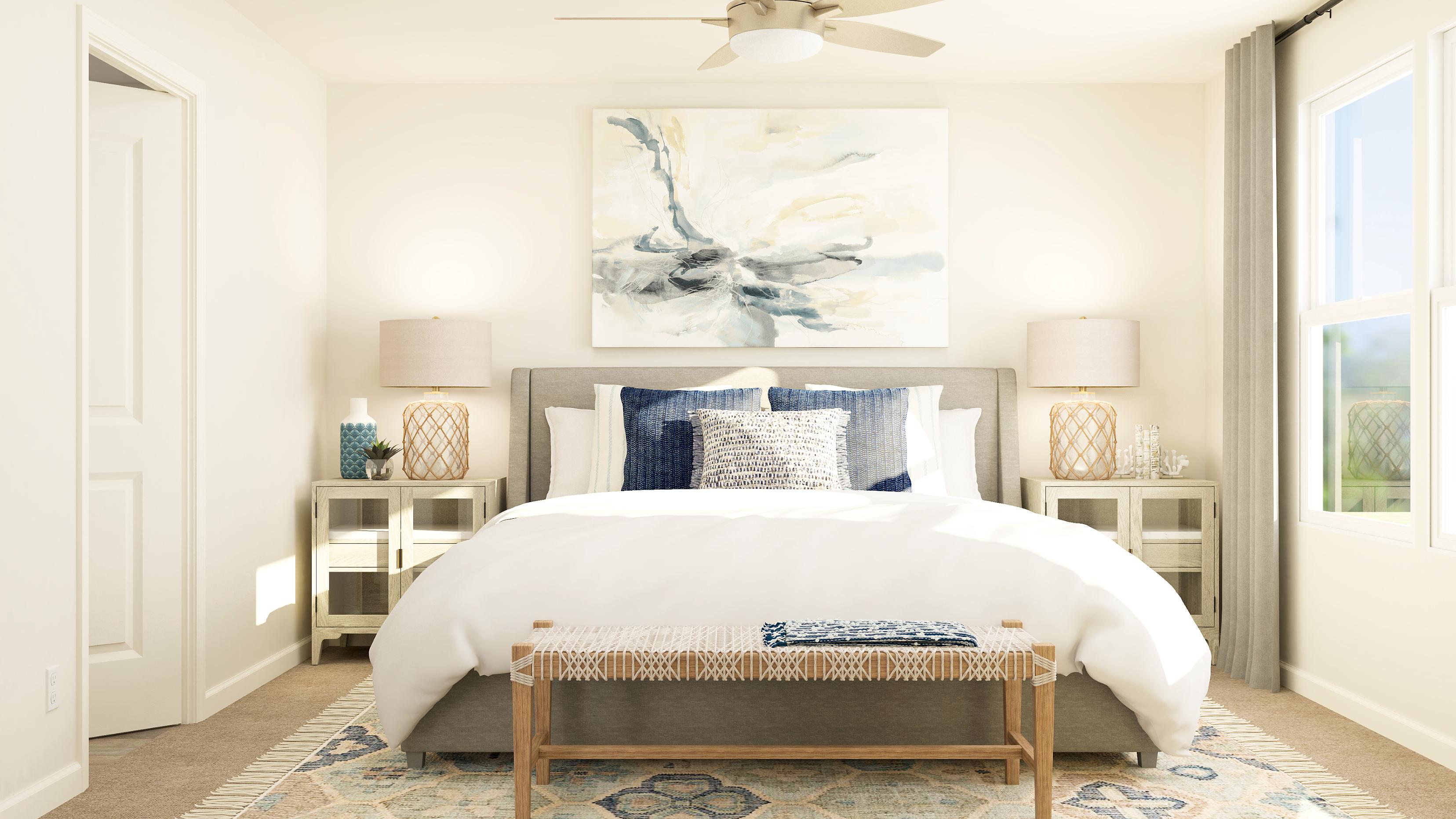 A bedroom with a bed and a painting on the wall.