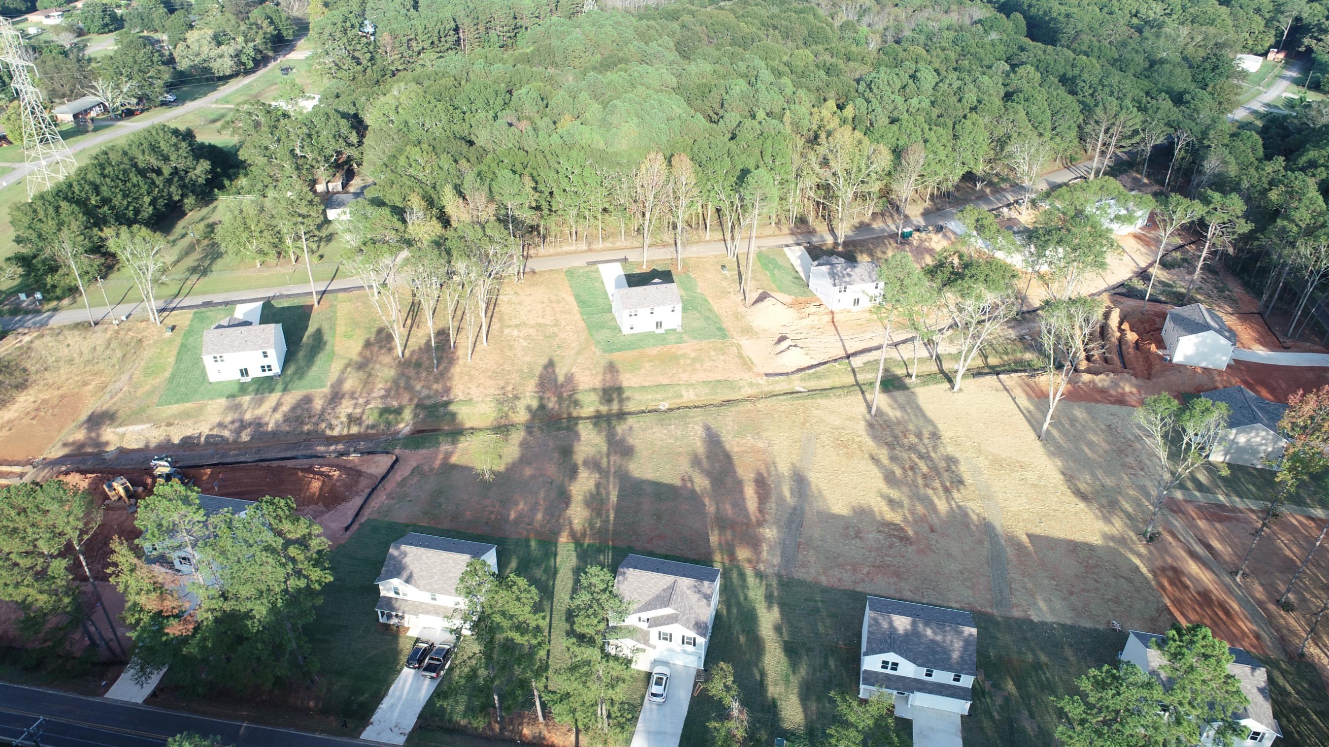 A landscape with trees and buildings.